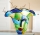 Gilde GlasArt Design-Vase "Visto" mit Gesicht, grün, blau, gelb mundgeblasen und durchgefärbt Länge 20,0 cm Breite 36,0 cm Höhe 30,0 cm